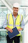 Portrait of engineer wearing hard hat in office