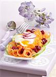 Carrot and beetroot salad with poached egg