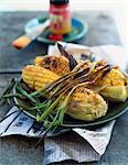 Grilled corn on the cob and scallions with soya butter