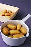 Cuire les pommes de terre dans une casserole d'eau