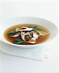 Wheat broth with  pak-choi cabbage and mushrooms