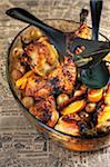 Roast legs of chicken with citrus fruit