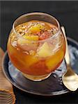 Citrus fruit in tea-flavored jelly