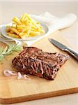 Grilled flank steak with french fries