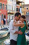 Italy, Burano, Mature couple embracing