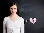 young woman against a chalkboard