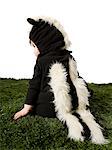 child dressed as skunk