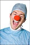 surgeon wearing a creepy clown nose