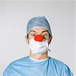 surgeon wearing a red clown nose