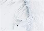 Pine Island Bay, Amundsen Sea, Antarctica, True Colour Satellite Image. True colour satellite of Pine Island Bay in the Amundsen Sea.The blakek mark crossing the image shows the limit between the indlansis of the Wallgreen coast and Pine Island Bay in Amundsen Sea, in the Western part of Antarctica. Image taken on 13 January 2001 using LANDSAT data.