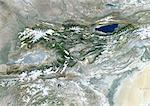 Kyrgyzstan, Asia, True Colour Satellite Image With Border And Mask. Satellite view of Kyrgyzstan (with border and mask). This image was compiled from data acquired by LANDSAT 5 & 7 satellites.