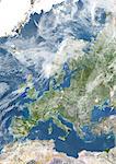 Europe With Cloud Coverage, True Colour Satellite Image. True colour satellite image of Europe with cloud coverage. This image in Lambert Conformal Conic projection was compiled from data acquired by LANDSAT 5 & 7 satellites.