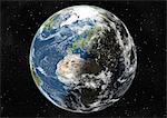 Monde centré sur l'Europe et l'Afrique, True Image Satellite en couleurs. Image satellite de véritable couleur de la terre centrée sur l'Europe et l'Afrique avec la couverture nuageuse, durant le solstice d'été à 6 heures GMT. Cette image dans une projection orthographique a été compilée à partir de données acquises par les satellites LANDSAT 5 & 7.