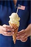 Woman Holding Vanilla Ice Cream Cone with American Flag