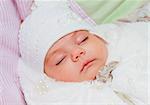 Portrait of a sleeping newborn baby girl