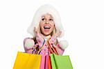 Winter shopping woman happy excited smiling holding bags