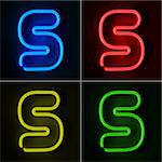 Highly detailed neon sign with the letter S in four colors