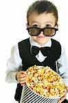 Young boy with popcorn and HD glasses isolated on white background