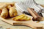 Fresh ginger root on a cutting board