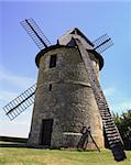 Back part of a traditional wooden windmill in France in the Eure &Loir Valley region.This is "moulin Froville Pensier" mill.