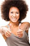Happy Afro-American young woman isolated on white doing a thumbs-up signal with her hand