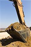 excavator loader during earthmoving works outdoors  at the quarry
