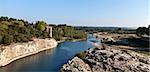 Gard or Gardon river near Remoulins in France - view from ancient roman Pont du Gard aqueduct bridge