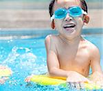 happy asian kid in Swimming Pool