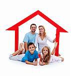 Happy home concept - young family with two kids and house sign