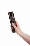 Television remote control in the hand isolated on white background