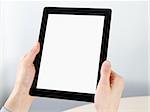 Man hands holding electronic tablet pc with blank screen.