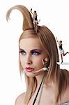 beauty portrait of blond young girl with her make up and creative hair style under costruction with little worker