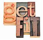 get fit - motivation concept  - isolated words in vintage letterpress wood type