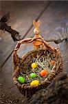 Easter decoration background with colorful eggs on wooden background
