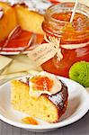 Sweet orange cake and jar of marmalade for breakfast.