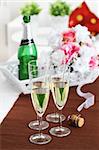 Sparkling wine with bouquet and wine bottle