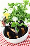 fresh mussels cooked in a white bowl