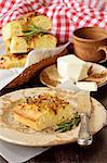 Flatbread with roasted onion and rosemary close up.