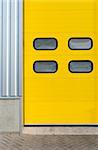 detail of a yellow industrial roller door