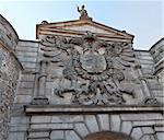 Coat of arms in the door of Hinge in Toledo, Spain.