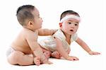 Full body two Asian baby sitting on white background