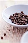 pepper grains in a blue bowl