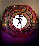 Background with abstract cycles and dancing girl silhouette.