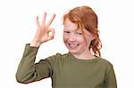 Redhaired girl showing ok sign
