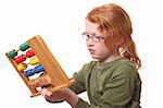 Young girl playing with an abacus on white background