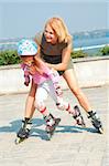 smiling 5 year old girl speedy going on her in-line skates