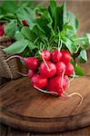 Vegetable background. Fresh radish on wood