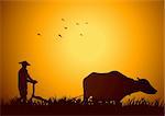 Silhouette illustration of a farmer plowing the paddy field