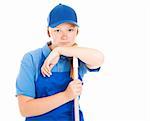Teenage girl in a work uniform, leaning on a mop or broom handle and looking bored and unhappy.  Isolated on white.