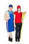 Two teenage girls or young adults working manual labor jobs and not happy about it.  Full body isolated on white.
